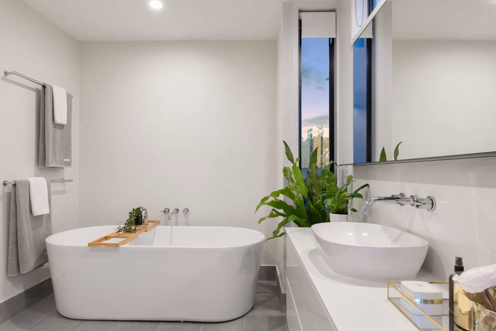 Modern bathroom renovation in Sydney with freestanding bath and vanity